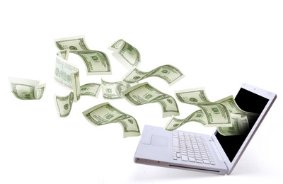 Money Flying Out of Laptop
